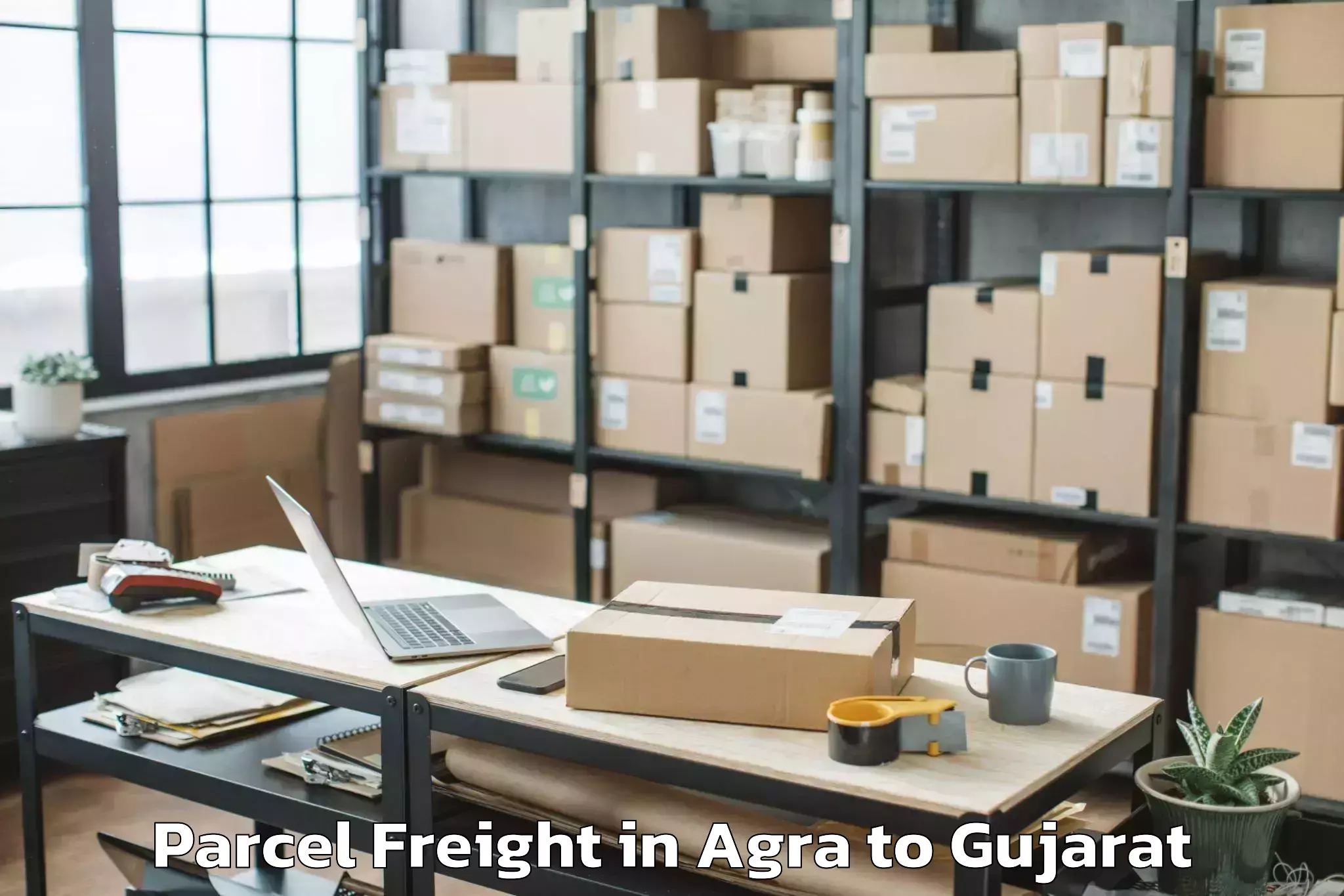 Book Agra to Mahesana Parcel Freight Online